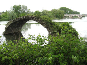 Dole - the old Roman Bridge against the new town bridge in 2010