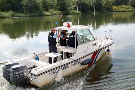 Gendarmes along the Moselle river in 2013.