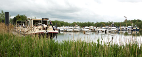 Histoire d'eau moored on the Moselle at Pont-a-Mousson in 2013.